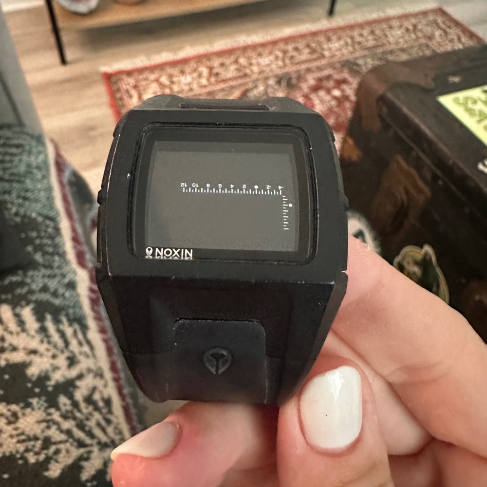 Nixon watch. Needs a new battery